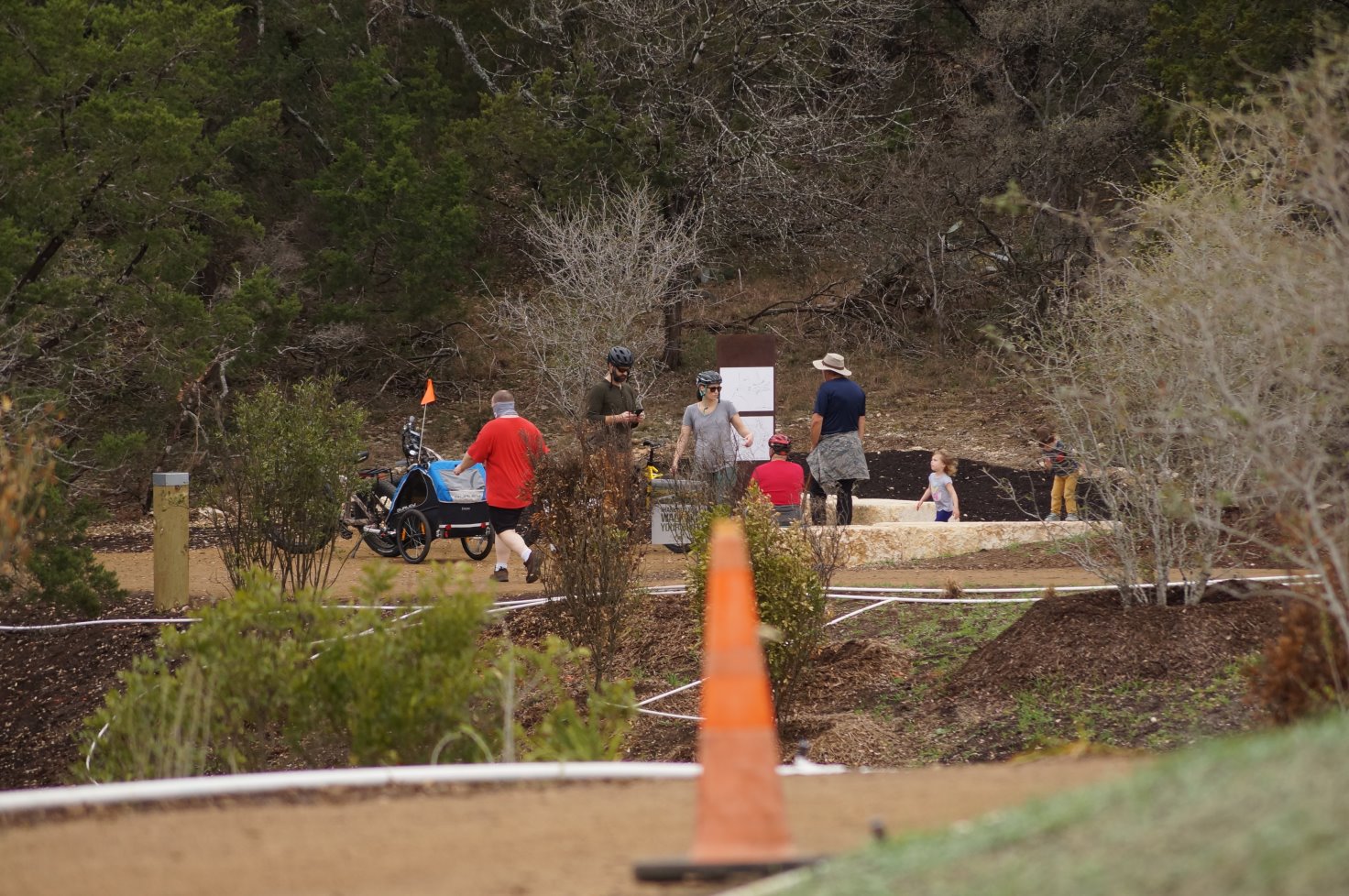 People on the other side of the bridge